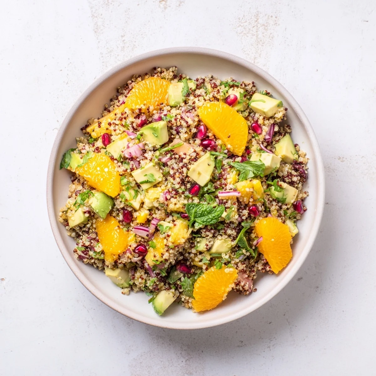 Fresh Citrus & Avocado Quinoa Bowl with bright orange segments and creamy avocado, ready to serve.
