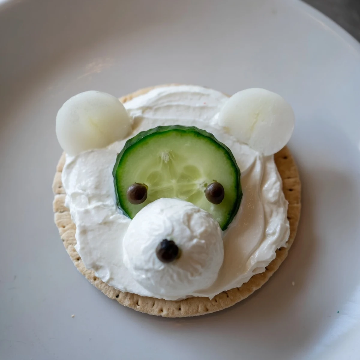 Vibrant Polar Bear Iceberg Cracker Stacks featuring creamy cream cheese and crisp cucumber, perfect for your appetizer platter.