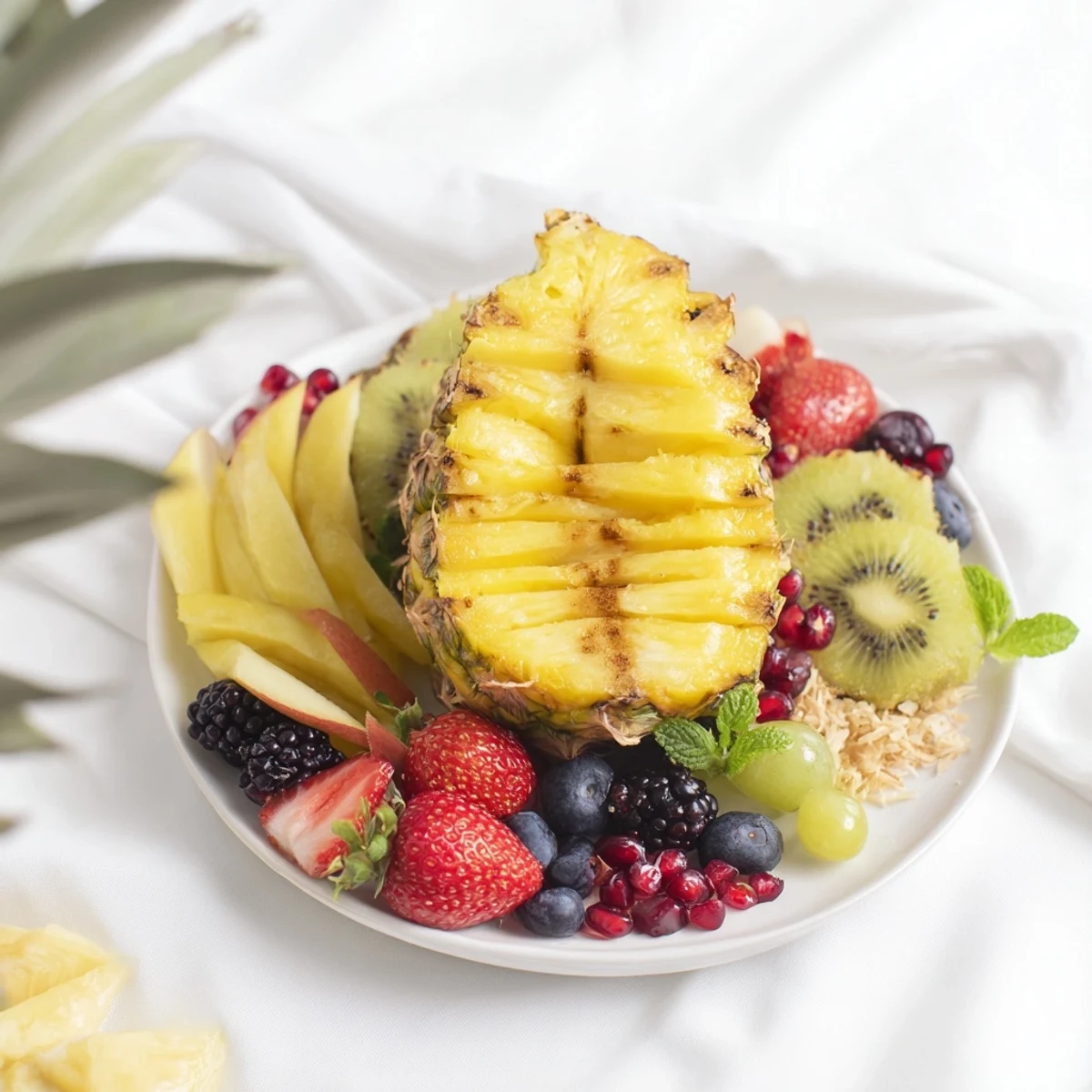 Fresh tropical fruits arranged beautifully on a platter, showcasing the vibrant Tropical Pineapple Paradise.