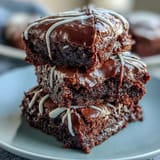 Delicious baseball-themed brownie bites with white icing laces, perfect for game day or sports parties.