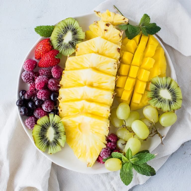 A colorful, elegant Tropical Pineapple Paradise fruit platter ready to enjoy, perfect for a summer dessert.